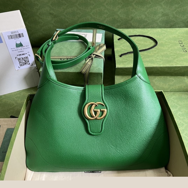 G*u*i top handle bags